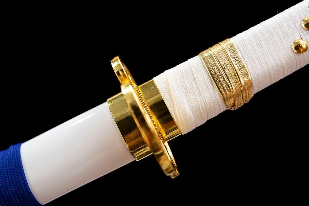 Gold‑plated alloy fuchi grip‑ring macro close‑up