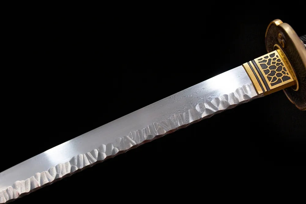 Upper T10 clay‑tempered katana blade brass habaki midare‑gunome meteor‑tail‑flame‑ripping hamon temper‑line macro close‑up