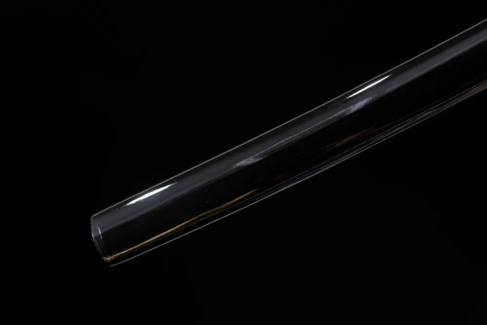 Bottom glossy‑black saya copper gilded‑silver kojiri end‑cap close‑up