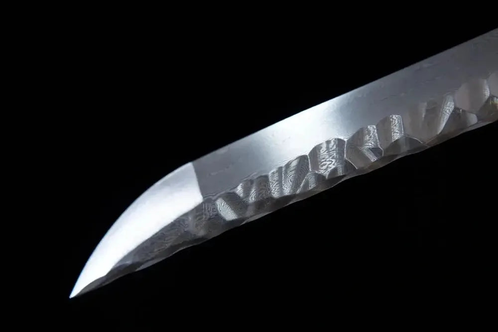 Sharp kissaki damascus tip close view