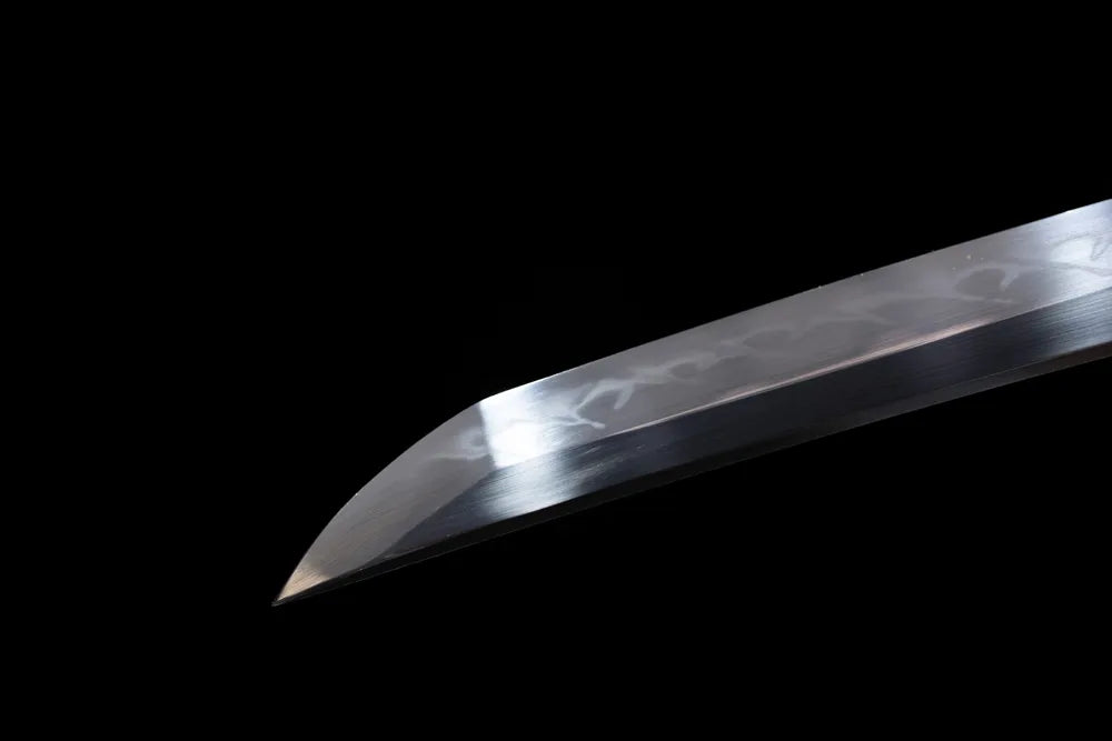 Compact functional wakizashi‑style kissaki tip of Red‑Plum‑Wakizashi blade close‑up view
