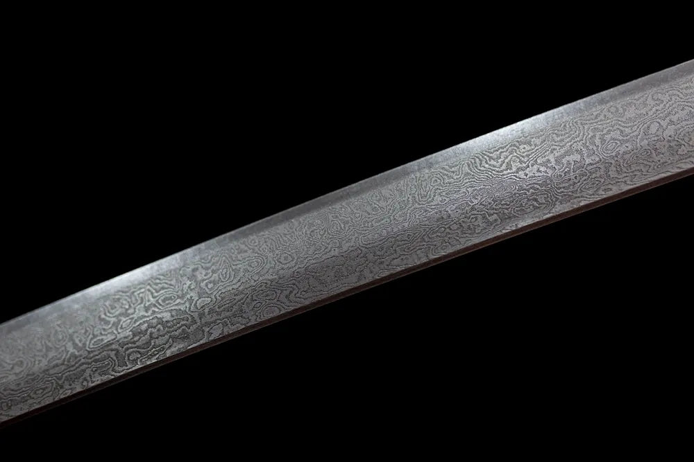Mid‑section multi‑layer damascus folded grain steel blade surface close‑up shot