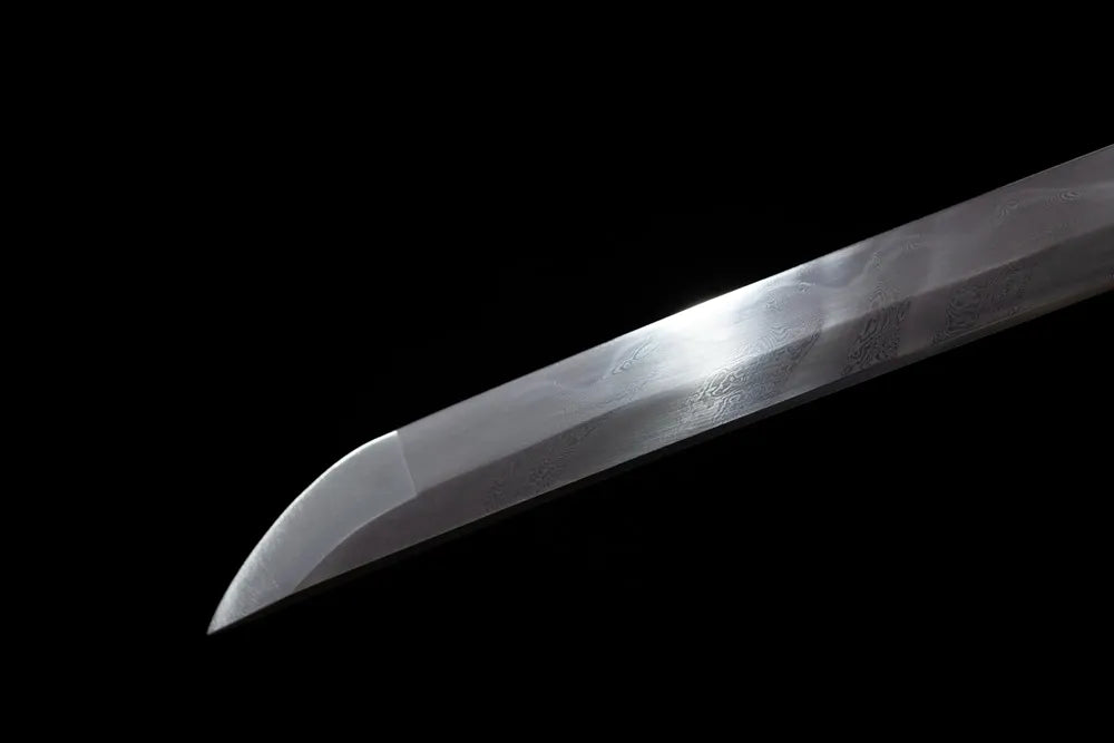Classic functional katana‑style kissaki tip of Paper‑Cranes‑Katana damascus‑steel blade close‑up view