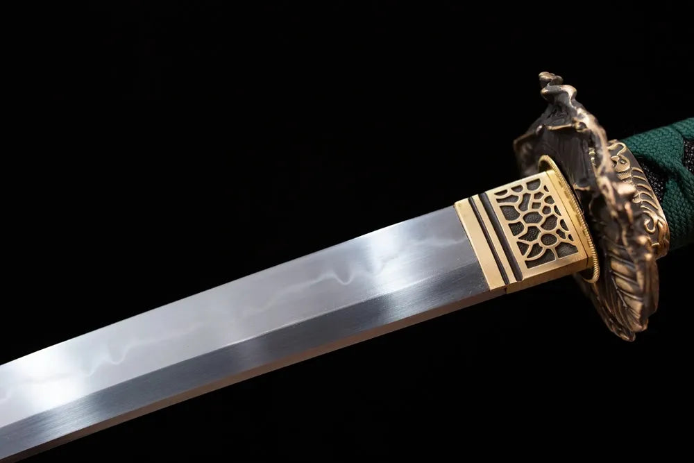 Upper T10 clay‑tempered katana blade brass habaki suguha‑gunome lively‑insect‑undulating hamon temper‑line macro close‑up