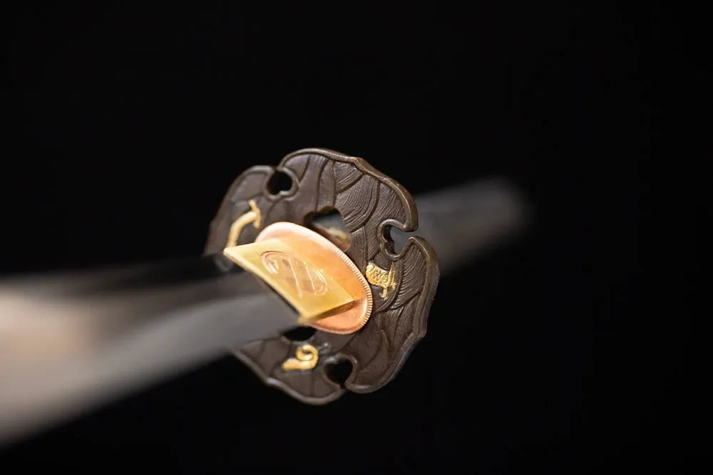 Front open‑work multi‑coiled‑dragon‑relief antique‑gilt bronze katana hand‑guard close‑up