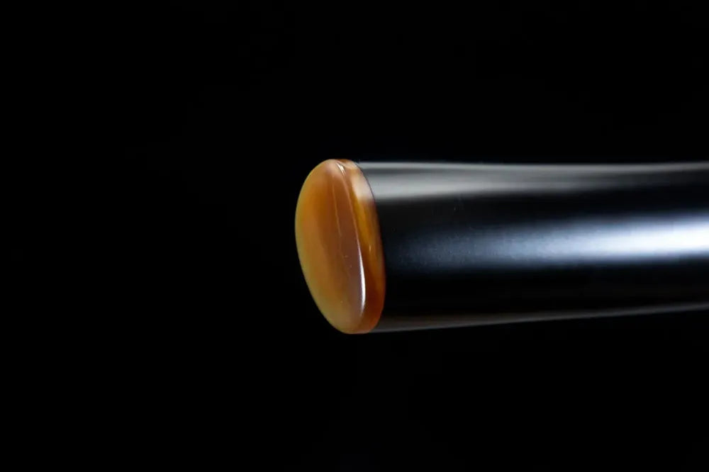 Bottom lacquered saya end cap