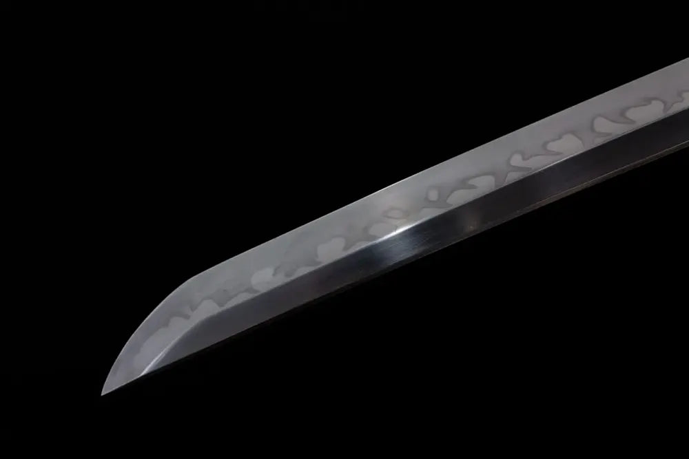Classic functional katana‑style kissaki tip of Sea‑Dragon‑God‑Katana blade close‑up view