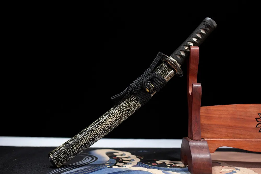 45° front fully sheathed Silver‑Bamboo‑Wakizashi quiet zen‑scholar‑aesthetic wakizashi placed on carved wooden sword display stand