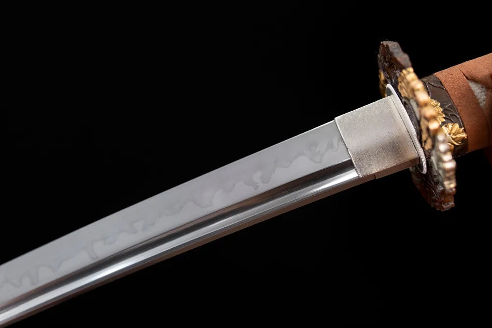 Upper T10 clay‑tempered katana blade brass habaki choji‑gunome petal‑undulating hamon temper‑line macro close‑up