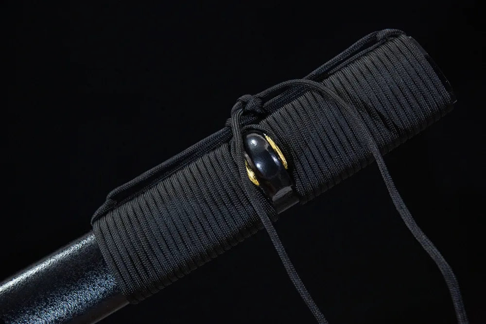 Thick black tactical woven sageo cord tied on nylon saya ring