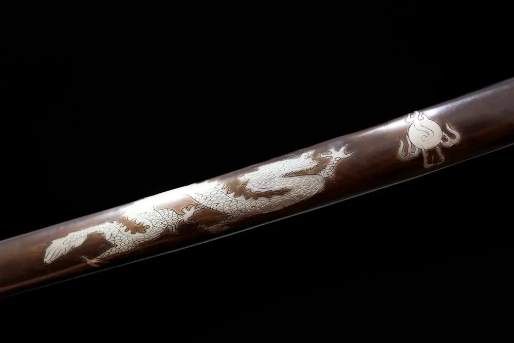 Mid‑section vintage‑brown lacquer hardwood katana saya silver‑carved oriental‑dragon graphic texture close‑up