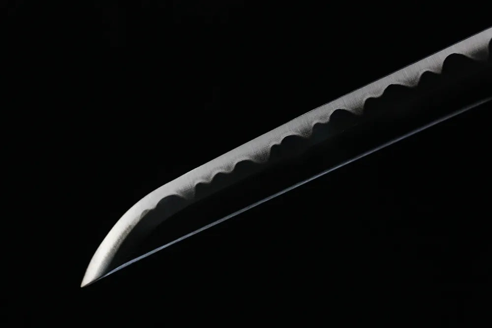 Sharp classic kissaki Sandai Kitetsu demon‑blade tip close view