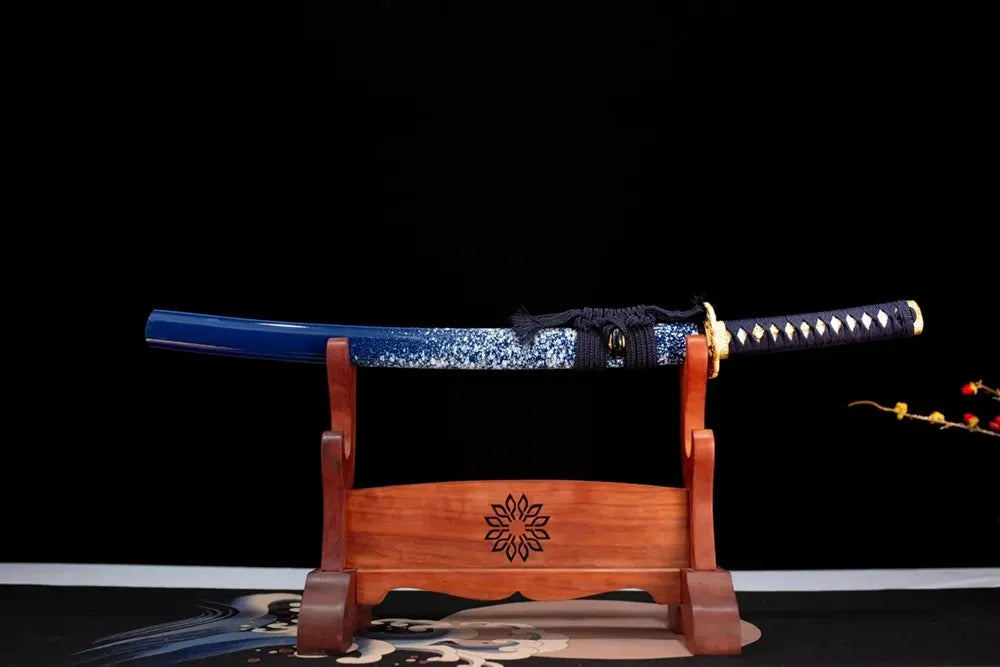 Horizontal laid closed royal‑blue white‑star‑speckle Mirror‑Heart‑Demon‑Wakizashi scabbard flat table‑top front display