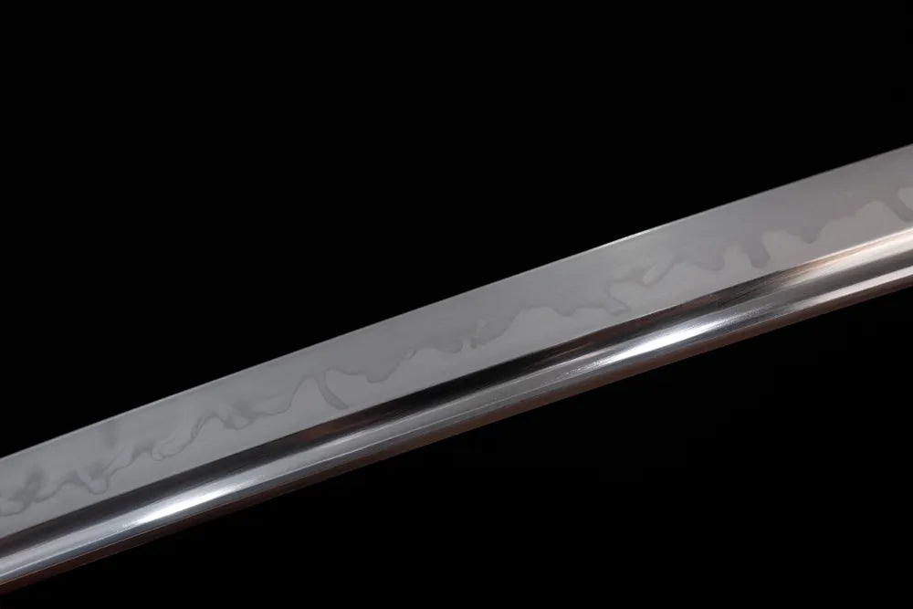 Mid‑section choji‑gunome petal‑undulating‑pattern hamon steel katana blade surface close‑up shot