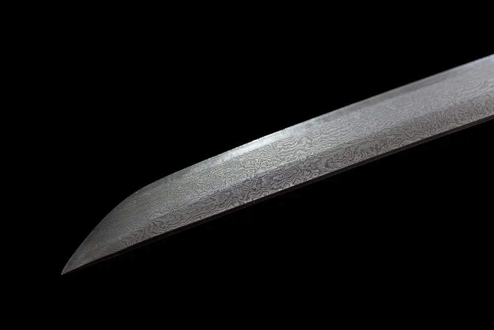 Extended tachi‑style functional kissaki tip of Night‑Eagle‑Tachi blade close‑up view