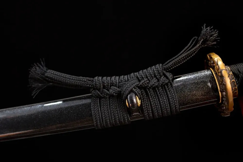 Thick heavy‑grade black‑cotton‑braided sageo cord matte‑dark‑aged‑copper fitting macro close‑up