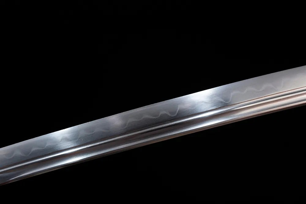 Mid‑section sanbonsugi three‑cedar‑tree‑pattern flowing hamon steel katana blade surface close‑up shot