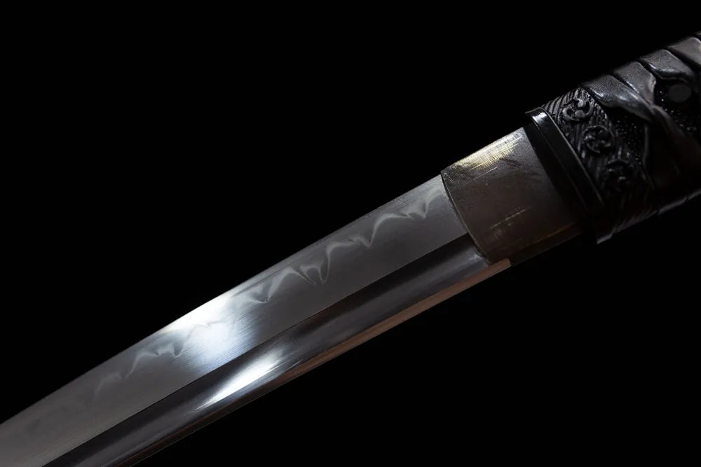 Upper choji wave hamon matte black habaki close-up