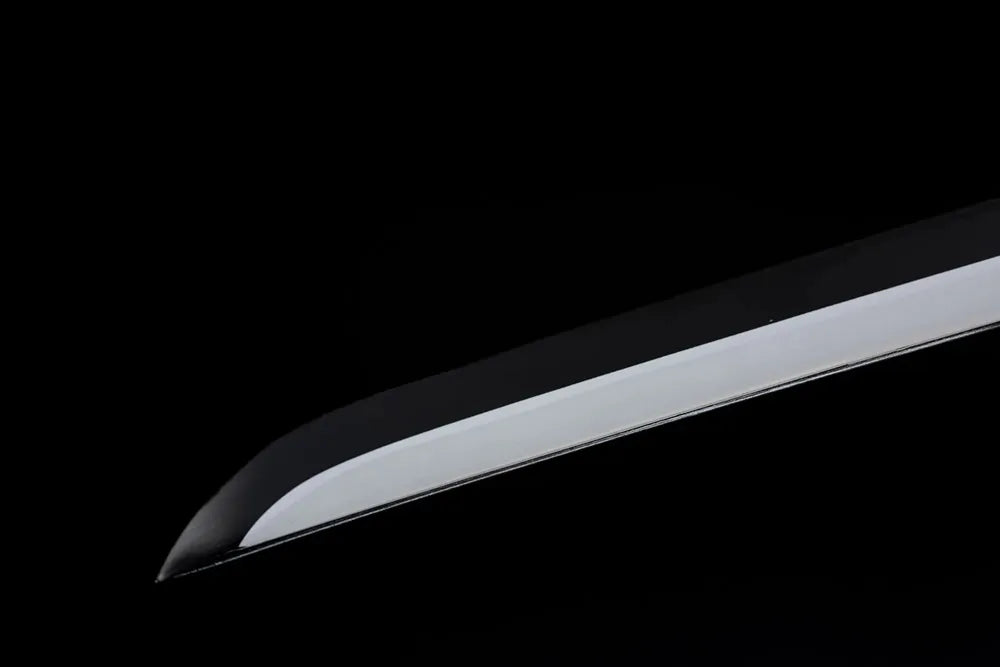 Sharp serrated kissaki Tanjirou second‑gen blade tip close view