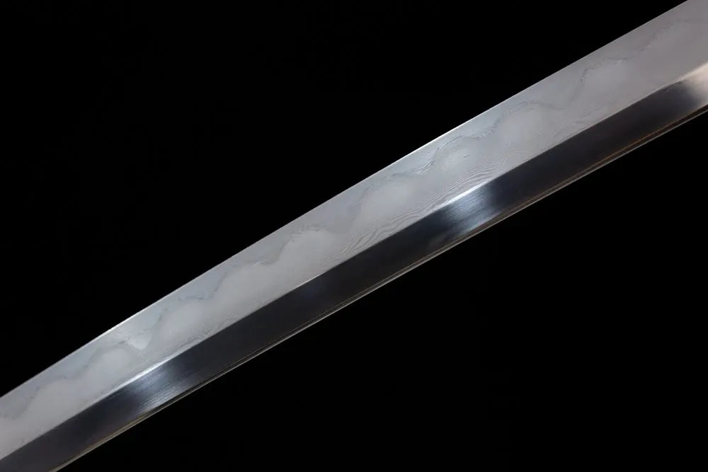 Mid‑section mixed‑suguha compound‑pattern hamon steel long katana blade surface close‑up shot