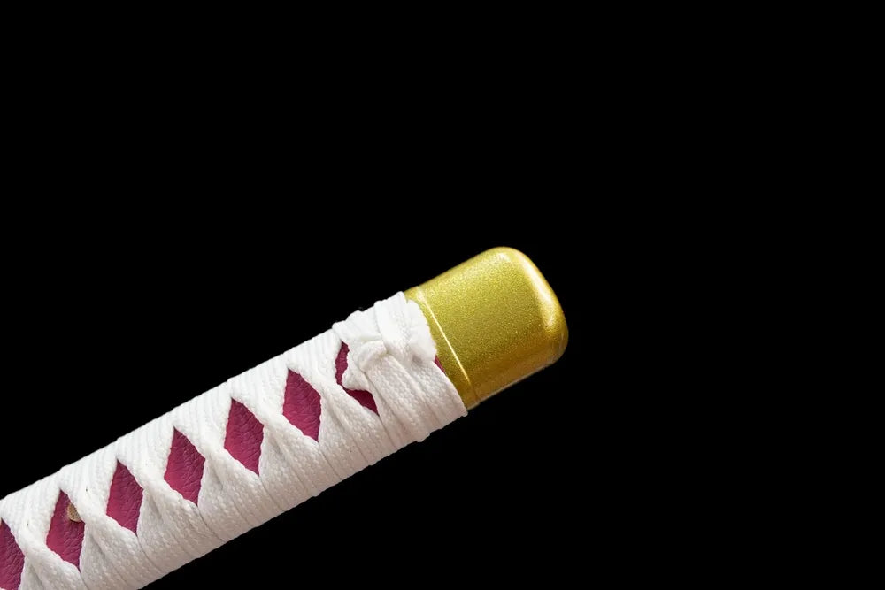 Top sakura‑engraved alloy kashira pommel front close‑up
