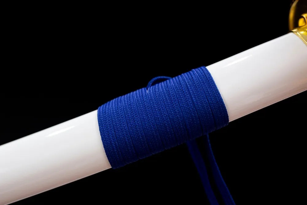 Thick royal‑purple braided sage cord gold‑plated fitting macro close‑up