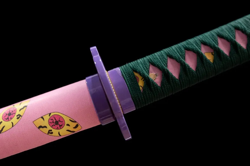 Purple‑tone alloy fuchi grip‑ring macro close‑up