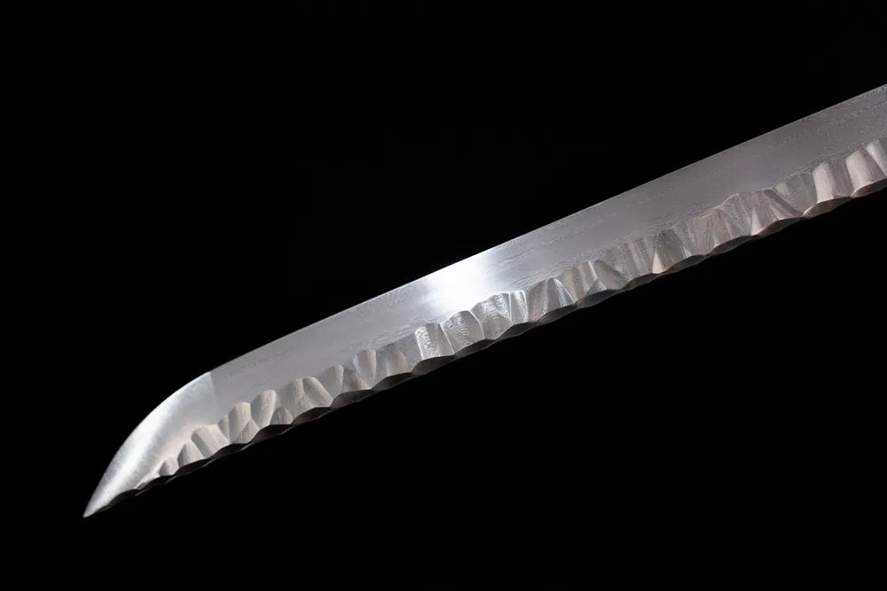 Classic functional katana‑style kissaki tip of Comet‑Katana blade close‑up view