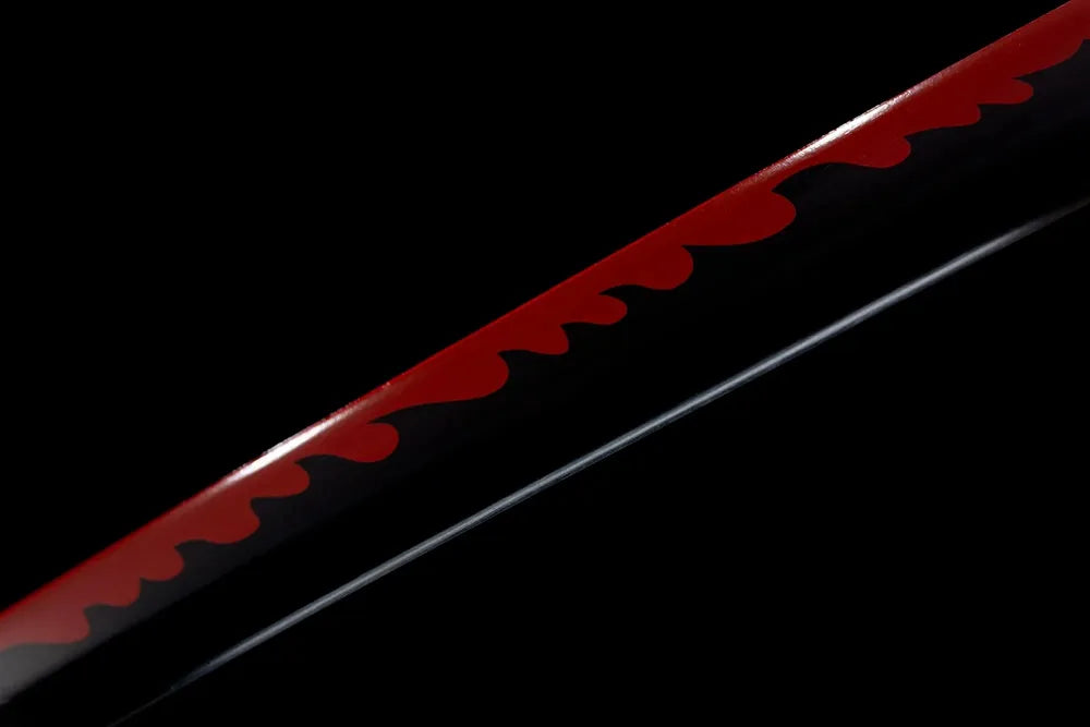Mid‑section red‑flame decorative printed steel blade surface texture shot