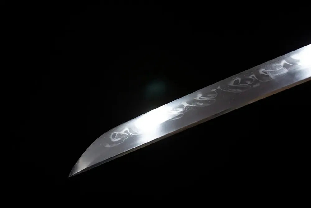 Classic functional katana‑style kissaki tip of Octagonal‑Snake‑Katana blade close‑up view