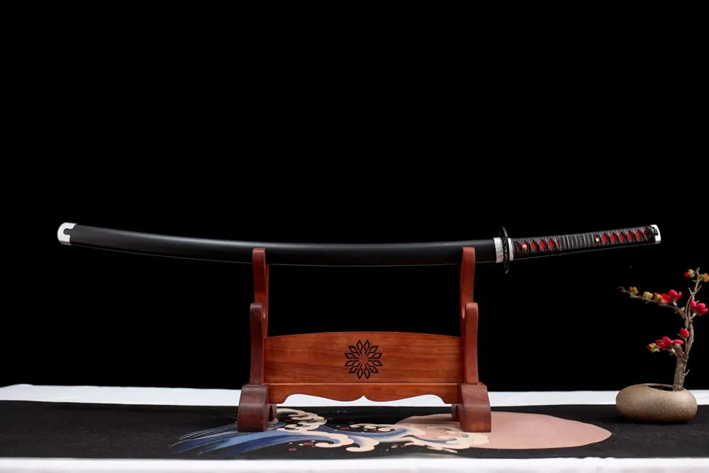 Horizontal fully sheathed Tanjirou scabbard flat table top front view shot