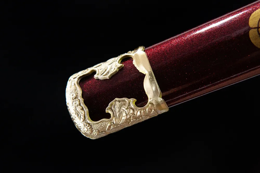 Bottom saya closeup carved floral gilded brass sheath end cap