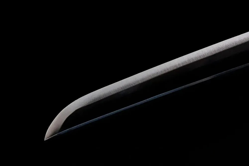 Smooth rounded notarekomi kissaki Muichirou blade tip close view
