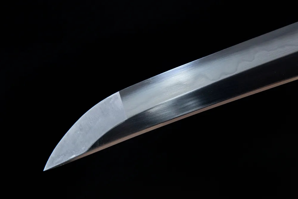 Kissaki tip closeup sharp mirror polished long tachi edge