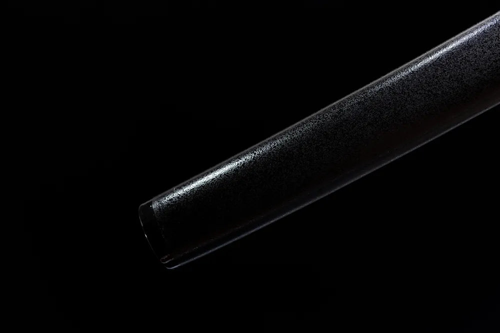 Bottom smooth black saya end cap close-up