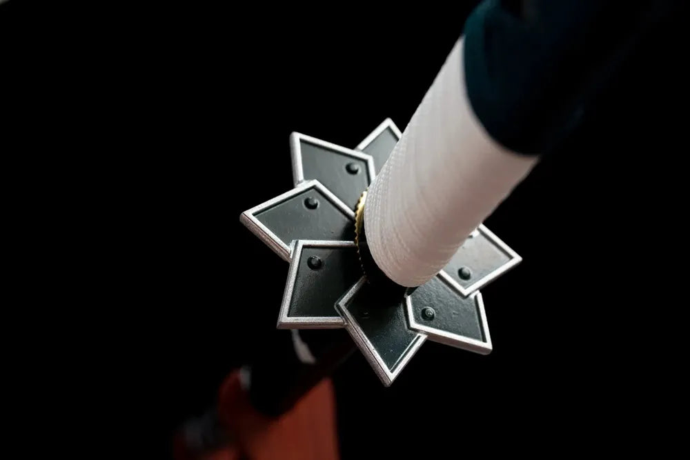 Reverse eight‑point jagged‑star alloy tsuba surface texture