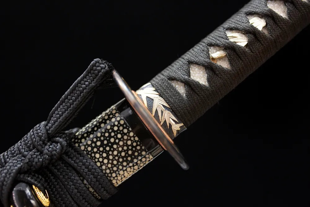 Bamboo‑joint‑relief matte‑silver alloy fuchi grip‑ring macro close‑up