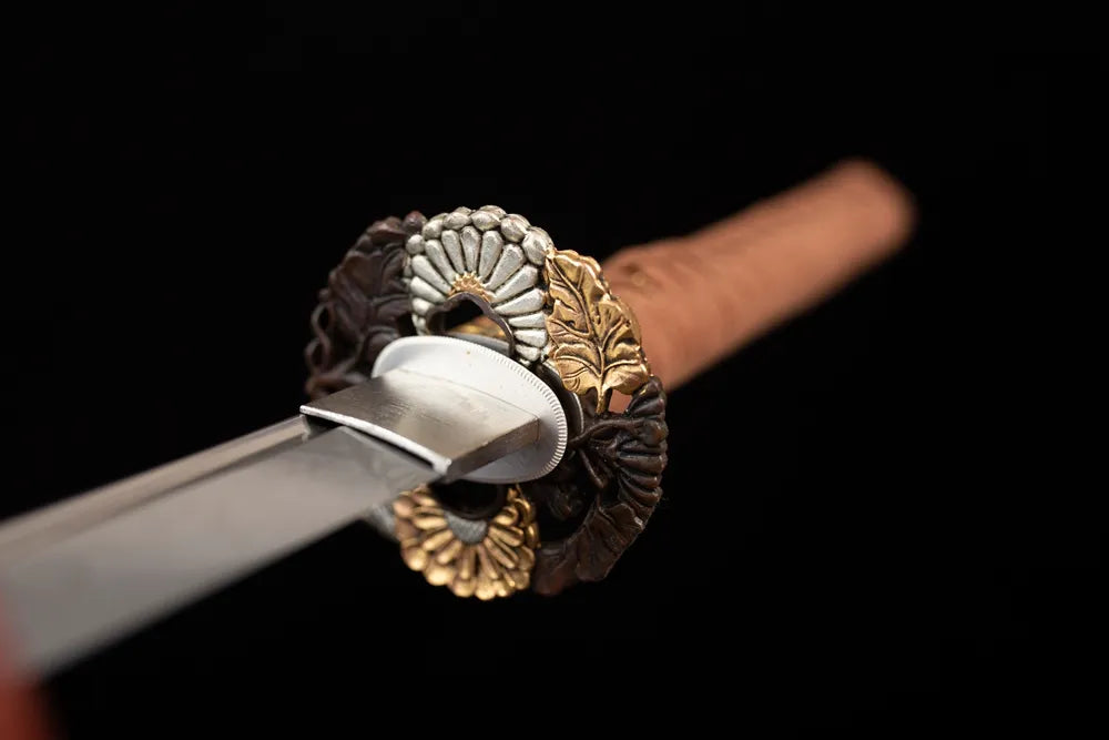 Front open‑work sunflower‑petal‑blossom‑relief brass‑gilded katana hand‑guard close‑up