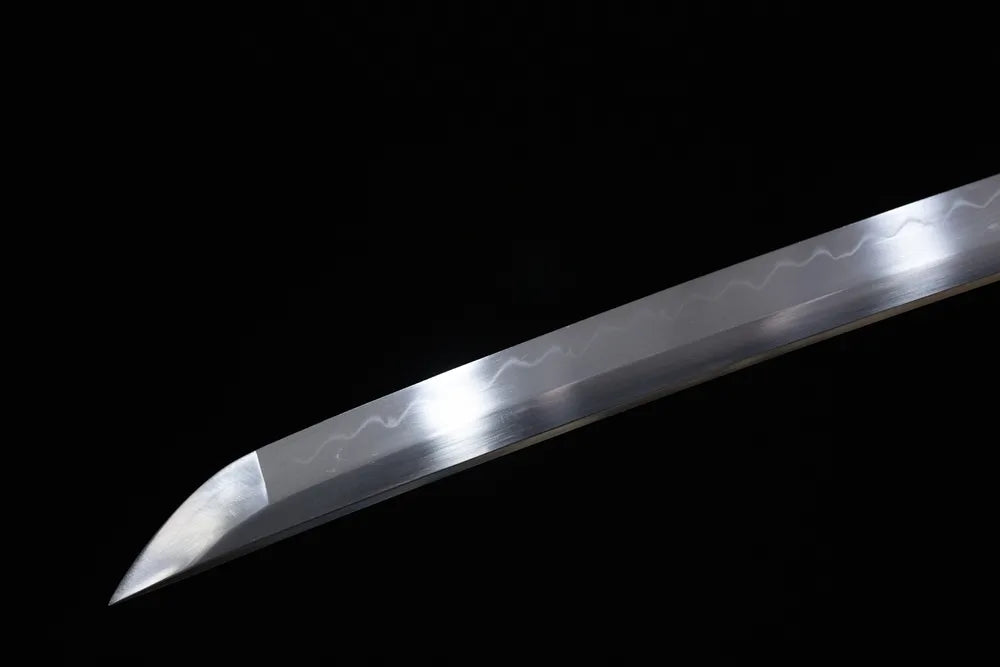 Classic functional katana‑style kissaki tip of Ghost‑Of‑Tsushima long katana blade close‑up view