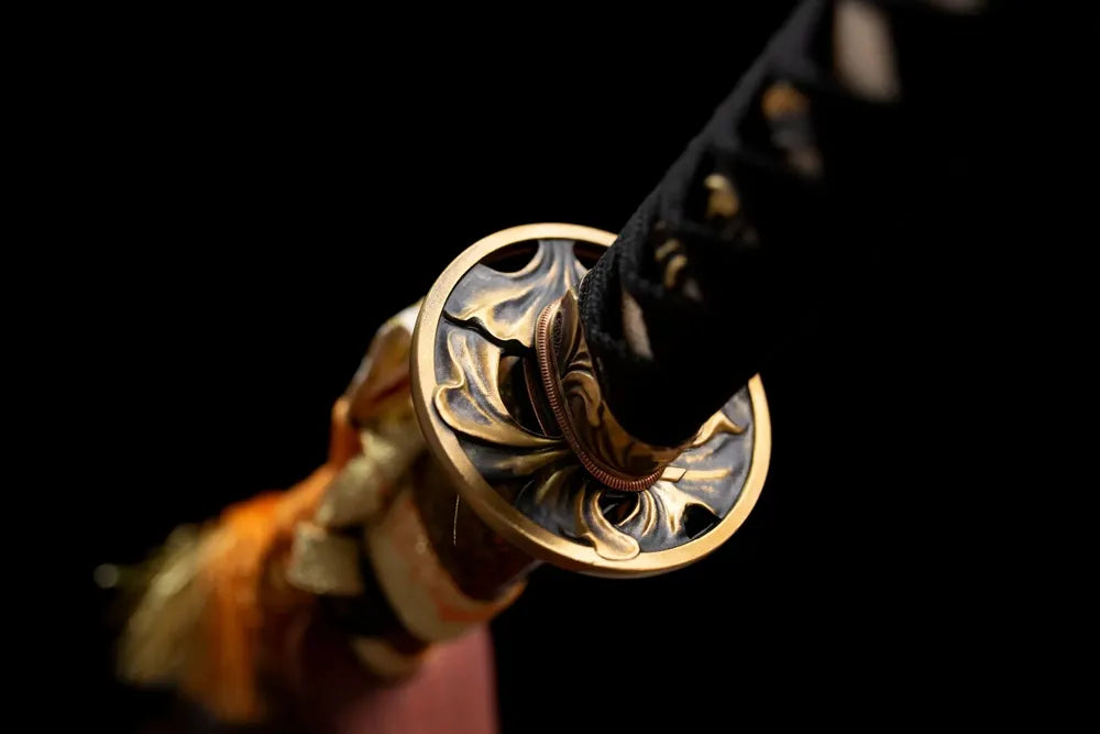 Reverse side sakura‑blossom hollow‑carving brass‑alloy tsuba surface texture close‑up