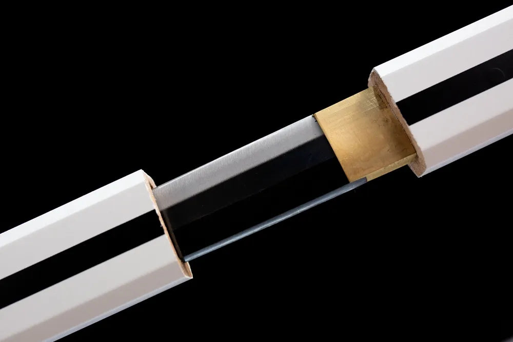 Close up image of white blade with half unsheathed cover