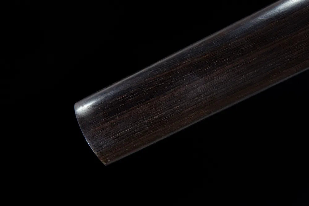 Bottom end of solid wood saya