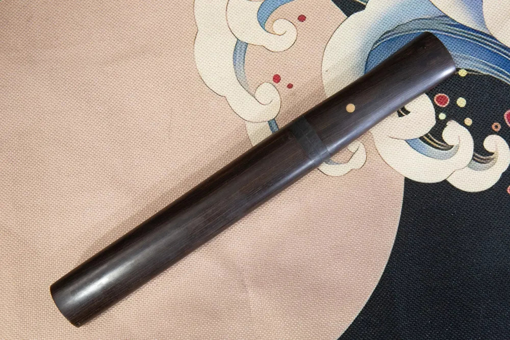 45 degree front view sheathed dark tanto