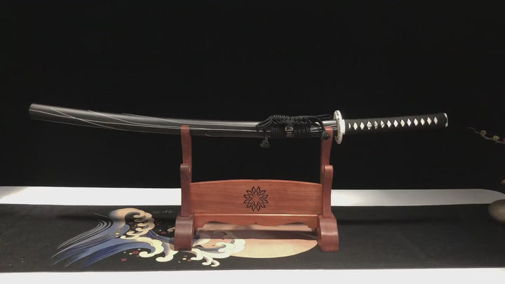 This katana（samurai sword） is forged from Damascus steel. The surface is oxidized and blackened