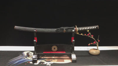 The cool black wakizhashi scabbard is real fish skin